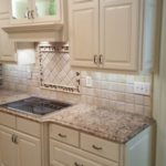 White Raised Panel Kitchen Cabinetry